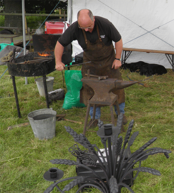 David Gowlett Blacksmith exibiting his skills